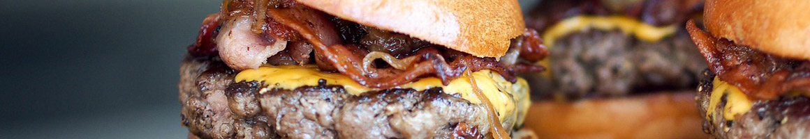 Eating American (Traditional) Burger at Slater's 50/50 restaurant in Pasadena, CA.